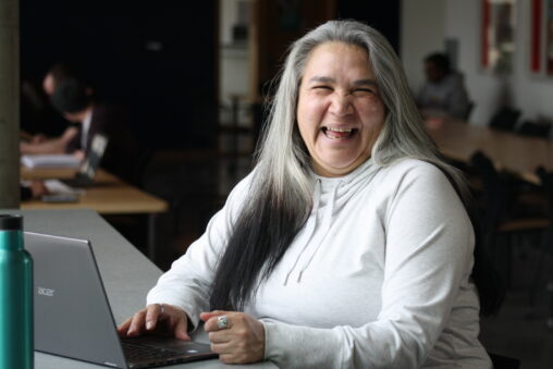 Indigenous student in a common space.