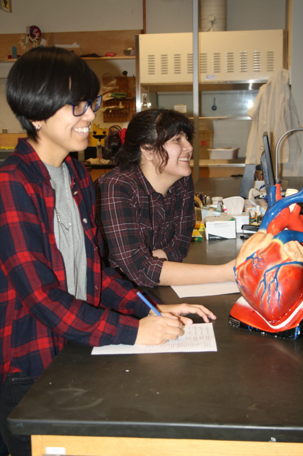 Indigenous students in a biology lab.