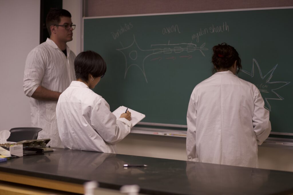 Indigenous students in a biology lab.