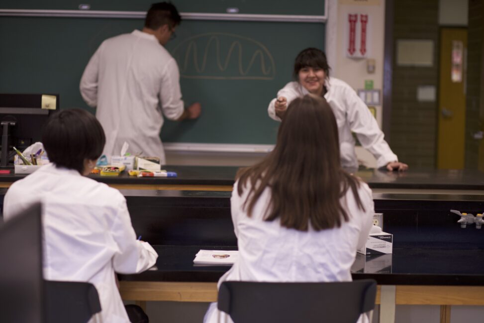 Indigenous students in a biology lab.