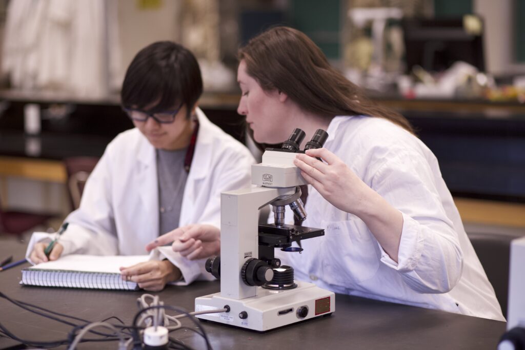 Indigenous students in a biology lab.
