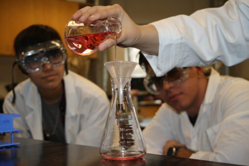 Indigenous students in a chemistry lab.