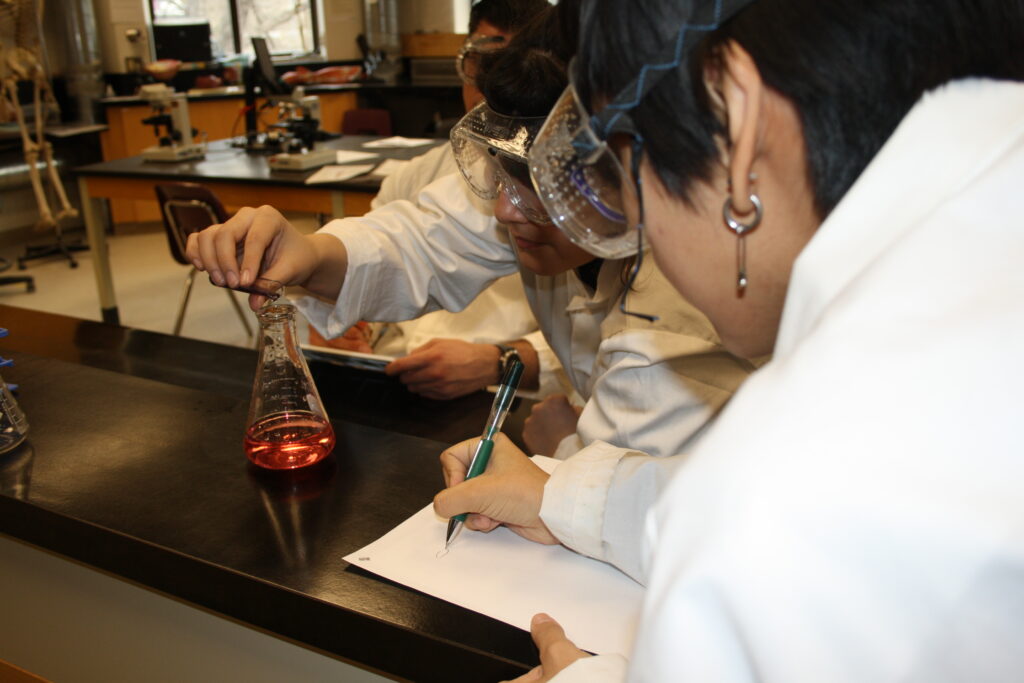 Indigenous students in a biology lab.