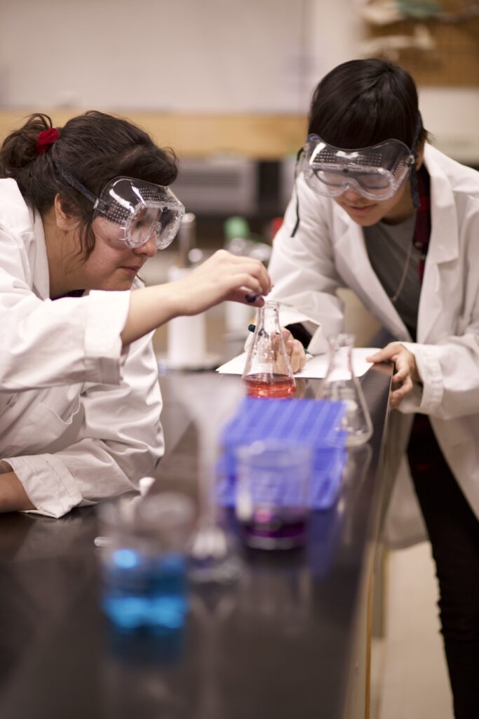 Indigenous students in a biology lab.