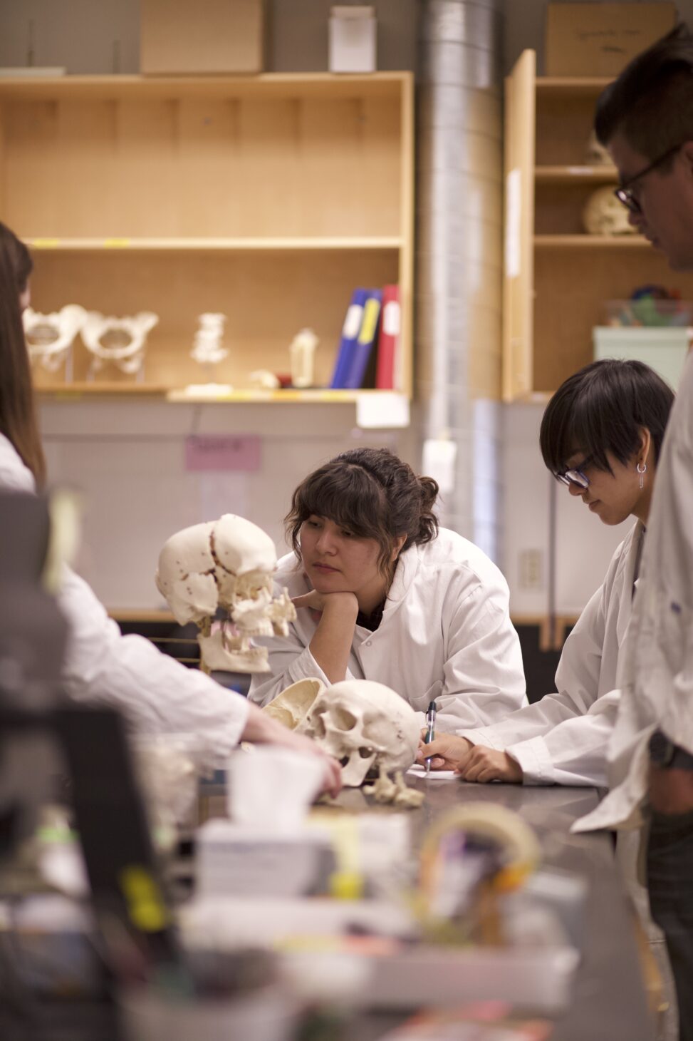 Indigenous students in a biology lab.