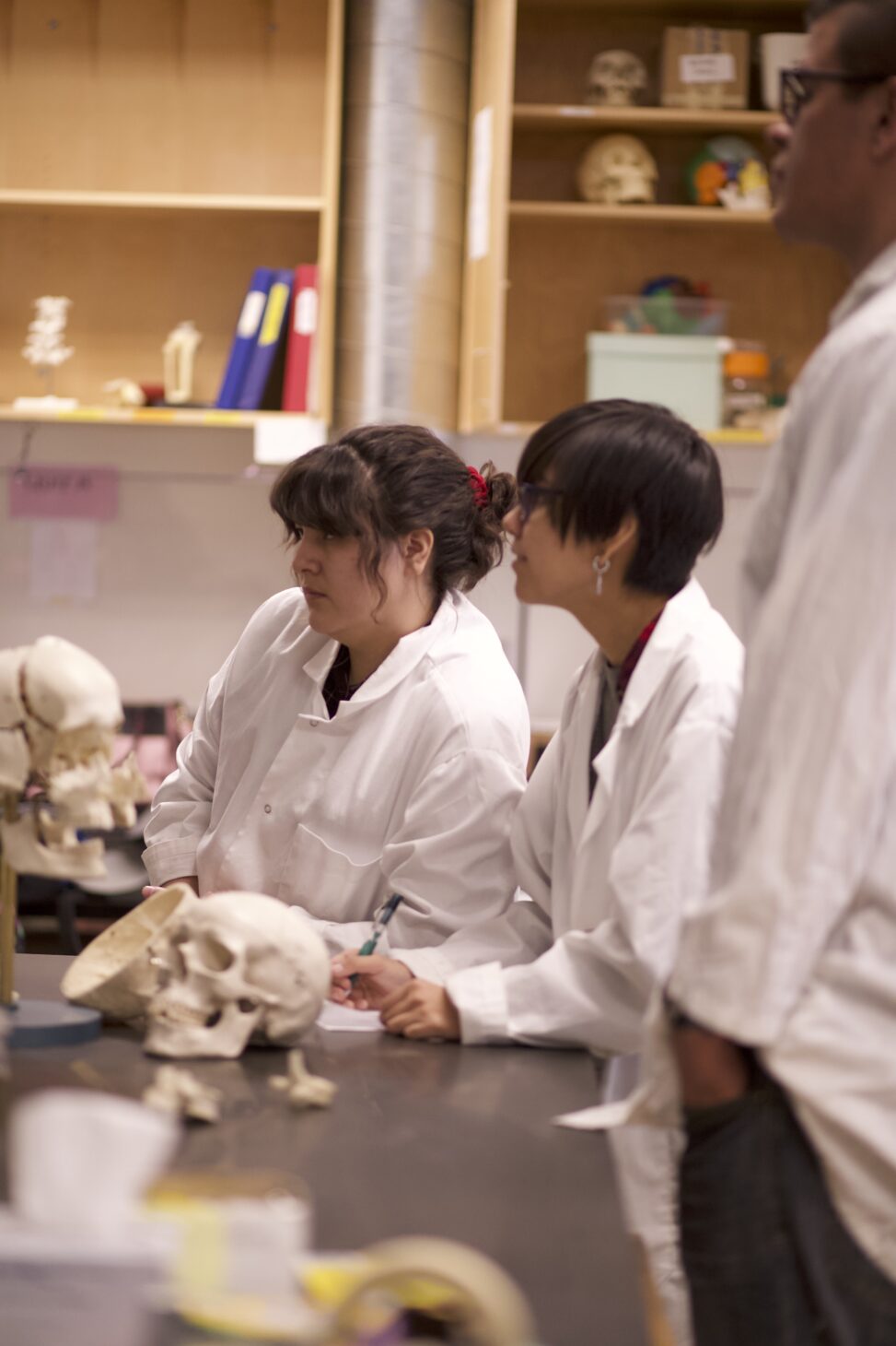 Indigenous students in a biology lab.