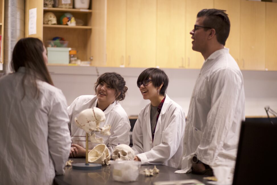 Indigenous students in a biology lab.