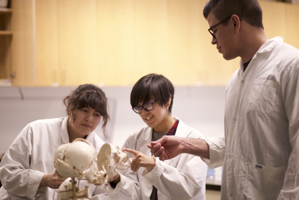 Indigenous students in a biology lab.